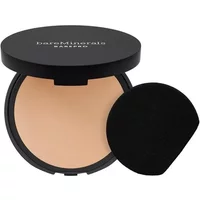 bareMinerals BAREPRO powder foundation in Light 22 Cool, round black compact with mirror and applicator sponge.