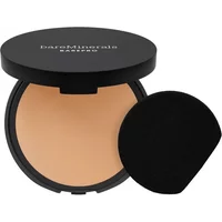 bareMinerals powder foundation in black compact with mirror, open to show neutral light shade, includes black applicator.