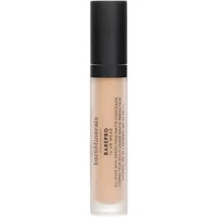 bareMinerals Barepro concealer in a clear tube with black cap, beige shade, and SPF 20 label.