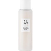 Translucent bottle of Beauty of Joseon Glow Replenishing Rice Milk, white cap, minimalist label with Korean text.