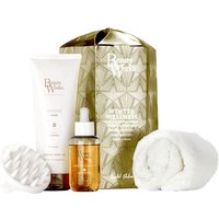 Beauty Works Winter Wellness set with gold box, hair oil, white tube, scalp brush, and rolled towel.