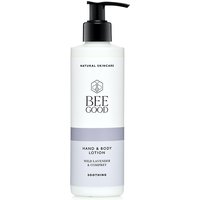 White Bee Good lotion bottle with black pump, purple label band, and hexagon logo, labeled "Wild Lavender & Comfrey."