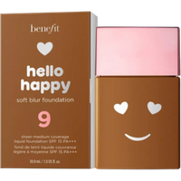 Brown Benefit Hello Happy foundation bottle with a smiley face and hearts, pink cap, shade 09, SPF 15, 30ml.
