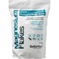 White bag of BetterYou Magnesium Flakes 5000g with blue text and health benefit icons.