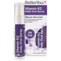 BetterYou Vitamin K2 Oral Spray 25ml with purple label, white cap, and matching box detailing dosage and benefits.