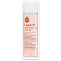 Clear bottle of Bio Oil Skin Care Oil 125ml with white cap and orange text.