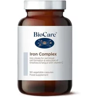 BioCare Iron Complex Capsules in a brown bottle with white label, blue logo, and text detailing iron citrate benefits.