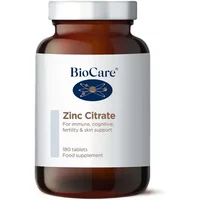 BioCare Zinc Citrate Tablets in a brown bottle with white label, blue logo, and text for immune support, 180 tablets.