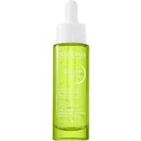 Bioderma Sébium serum in a green translucent bottle with a white dropper cap, 30ml size.