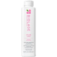 White Biolage ColorLast Shampoo bottle, 400ml, with pink logo and green leaf design.