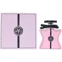 Pink star-shaped Bond No 9 Madison Avenue Eau De Parfum bottle with black cap, next to matching pink box.