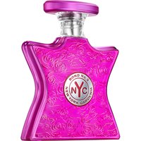 Pink star-shaped Bond No. 9 New York Gardenia perfume bottle with floral engravings and silver cap.
