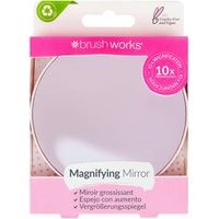 Round brushworks 10X magnifying mirror in pink packaging with eco-friendly symbol and multilingual text.