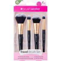 Mini brush set with black handles, gold ferrules, and soft white bristles in pink packaging.