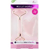 Rose Quartz Resin Roller with pink handle and matching Gua Sha tool in clear packaging with polka dot background.