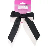 Black and white satin hair bow duo with long tails, attached to a pink Brushworks packaging card.