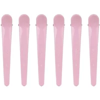 Pink Brushworks sectioning clips x6, sleek design with rounded ends, arranged in a row.
