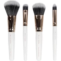 White Brushworks travel brush set with rose gold ferrules, includes four brushes with black and white bristles.