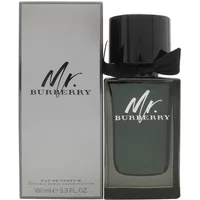Mr. Burberry Eau De Parfum 100ml bottle with black cap and bow, next to matching silver box with logo.