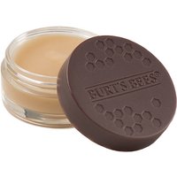 Burt's Bees lip treatment in a small round jar with a brown lid featuring honeycomb design.