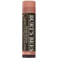 Burt's Bees Tinted Lip Balm Zinnia in a brown tube with white text and a pink cap.