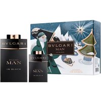 Bvlgari Man In Black Gift Set with black and rose gold bottles, festive illustrated box with winter scene.