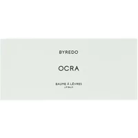 White Byredo Lip Balm Ocra packaging with minimalist black text design.