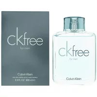 Clear glass bottle with silver cap, labeled "ck free" by Calvin Klein, next to a dark gray box.