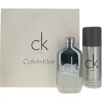 Calvin Klein CK One Essence set with clear perfume bottle and silver deodorant spray, minimalist design.