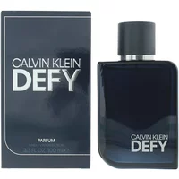 Calvin Klein Defy Parfum 100ml, sleek dark blue bottle with black cap, next to matching branded box.