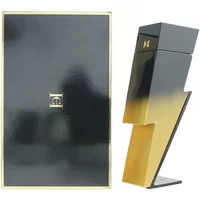 Carolina Herrera Bad Boy Extreme Eau De Parfum 150ml, black and gold lightning bolt-shaped bottle with matching box.