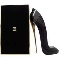 Carolina Herrera Good Girl perfume in a black stiletto-shaped bottle with a gold heel, next to a black box.