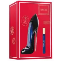 Red box with Carolina Herrera Good Girl stiletto-shaped perfume bottle and slim blue travel spray.