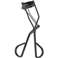 Black Catrice Cosmetics eyelash curler with ergonomic handles and cushioned pad.