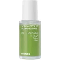 CELIMAX The Real Noni Ampoule 30ml, green bottle with white cap, labeled for calming and radiance, promotes healthy skin.