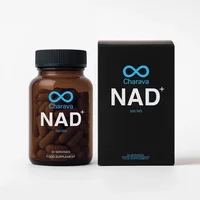 Brown bottle of Charava UK NAD+ 500mg capsules with black lid, next to black box with blue and white branding.