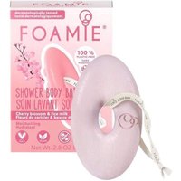 Pink oval FOAMIE body bar with string, cherry blossom and rice milk scent, next to matching pink box.