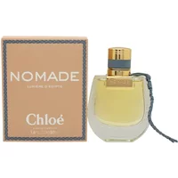 Chloé Nomade Lumiere d'Egypte Eau De Parfum 50ml, clear glass bottle with gold cap and braided detail, next to box.
