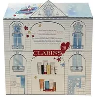 Clarins 12 Day Advent Calendar, house-shaped box with windows, stars, and skincare products visible inside.