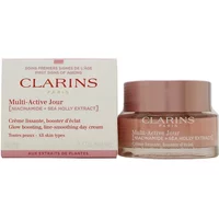 Clarins Multi-Active Day Cream, pink jar with rose gold lid, next to matching pink and white box, 50ml size.