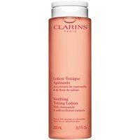 Clarins Purifying Toning Lotion 200ml, peach-colored bottle with white cap and red text.