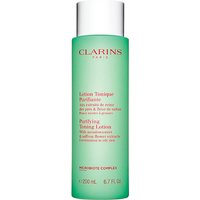 Green Clarins Purifying Toning Lotion bottle, 200ml, with red logo and white text detailing ingredients.