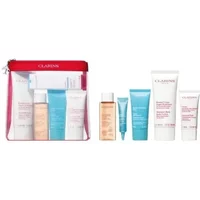 Clarins Travel Body Care Set with five assorted skincare tubes and bottles in a clear red zippered pouch.