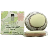 Clinique Almost Powder Makeup SPF 15 Medium in round compact with mirror, beige powder, and green floral box.