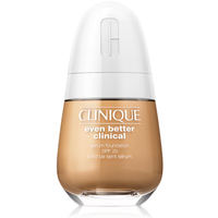 Clinique serum foundation SPF20 in CN 74 Beige, teardrop-shaped bottle with white cap and silver logo.