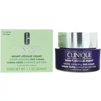 Clinique Smart Clinical Repair cream in a purple jar with silver lid, next to a light green box, 50ml size.
