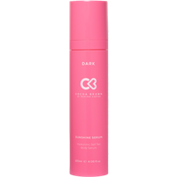 Pink bottle of Cocoa Brown Sunshine Serum - Dark, with white text and logo, cylindrical shape, 150ml size.