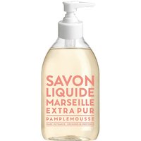 Clear bottle of Compagnie De Provence liquid soap with pink grapefruit label and white pump dispenser.