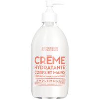 White bottle of Compagnie De Provence Grapefruit Body and Hand Cream with pump dispenser and orange text.