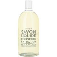 Clear bottle of Compagnie De Provence Liquid Marseille Soap Refill with gray text, 1000 ml, olive wood scent.